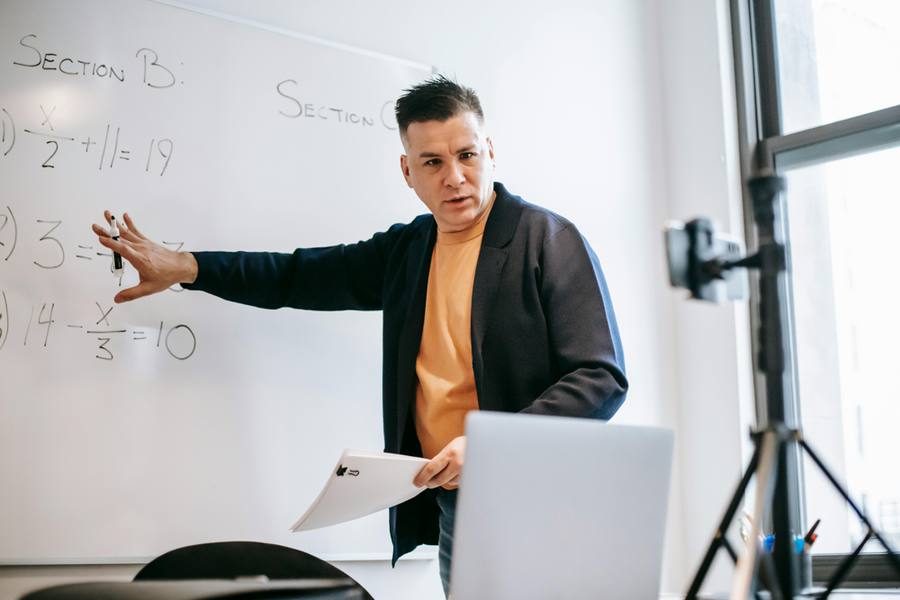 Online Tutoring Jobs for Beginners study books laptop online class