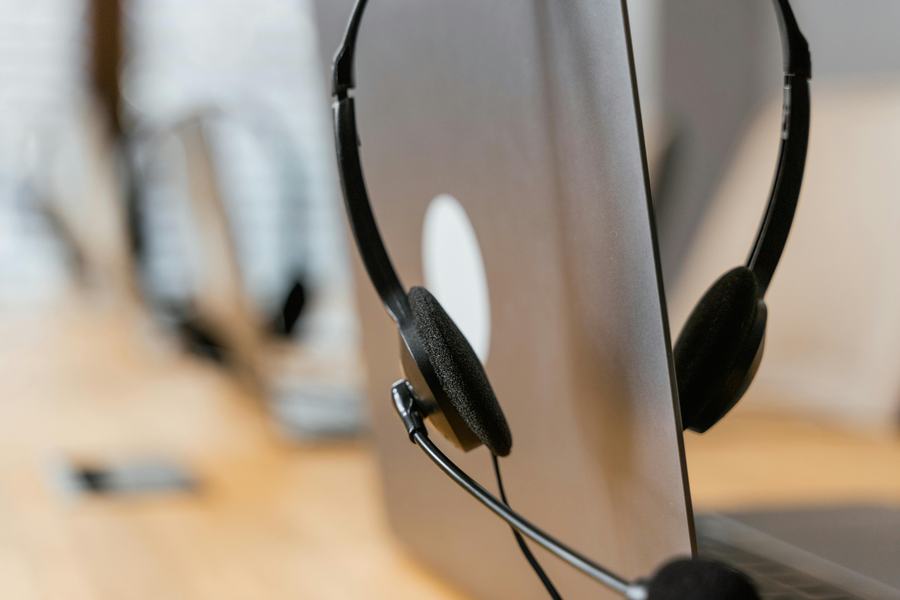 remote customer service jobs from home with headset and laptop