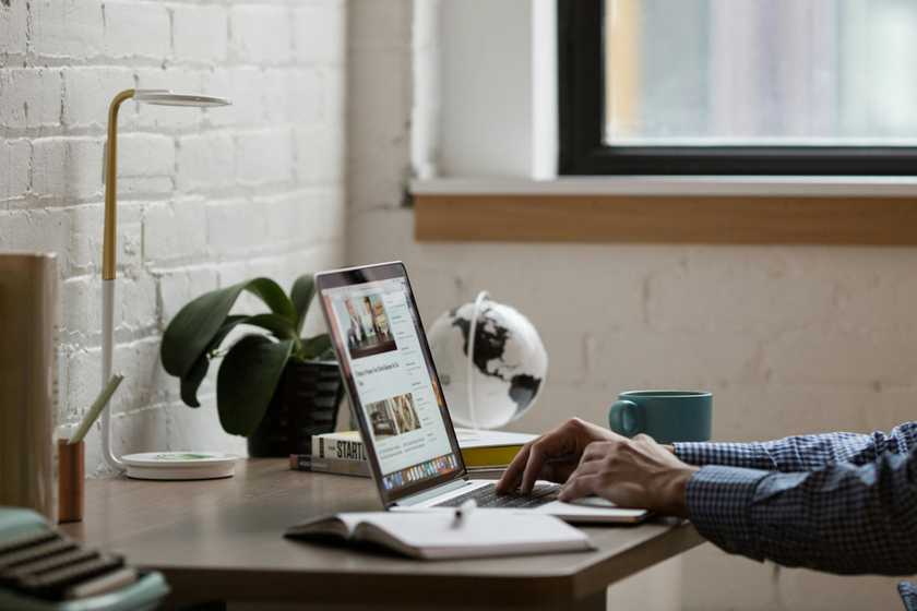 Virtual assistant working remotely on a laptop